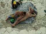 Sex on the beach with a mature couple
